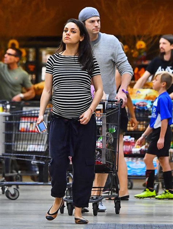 Mila Kunis Looks Ready To Pop While Shopping With Ashton Kutcher At 8 Months Pregnant
