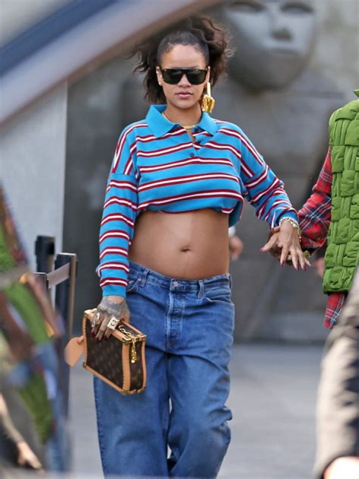 Pregnant Rihanna Rocks Yellow Crop Top With A$AP Rocky In Paris: Photos